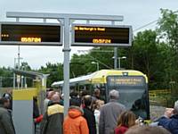 The first tram on the old ‘Oldham Loop’ line boarding at Oldham Mumps stop at 05:57 to form the 06:00 departure on 13 June 2012.  (Photo R Clarke.)
